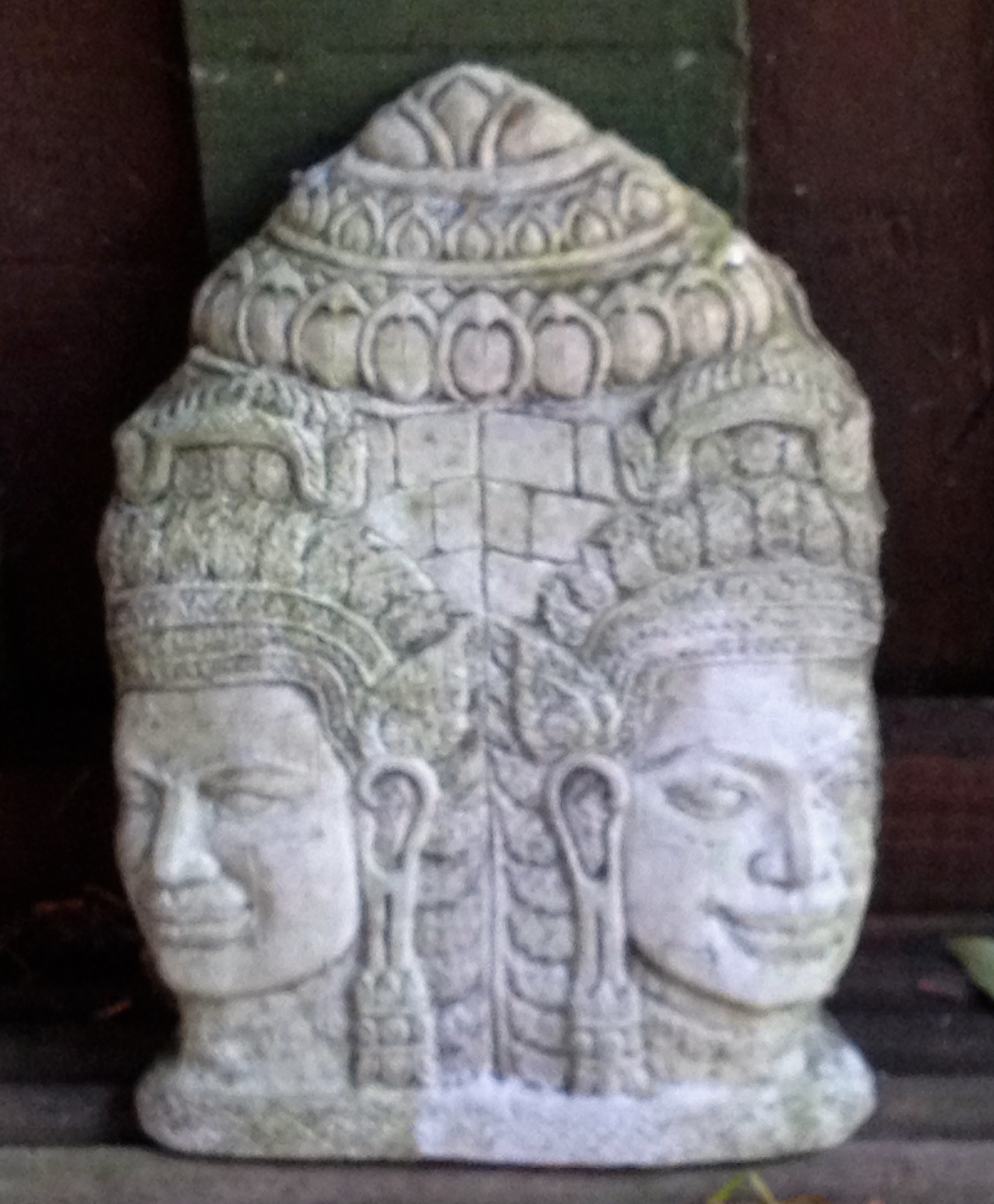 Agni: the two-faced fire god at the Mandala Ashram. He is the link between heaven and earth as messages to the gods can be conveyed by the medium of fire.